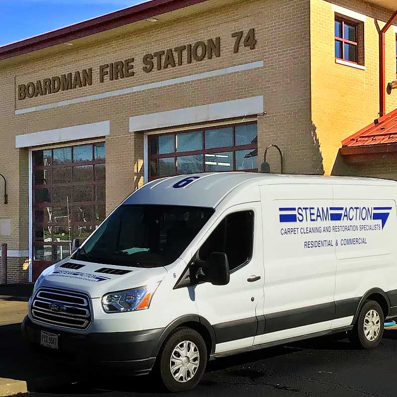 carpet-cleaning-truck-number-6-in-front-of-firehouse